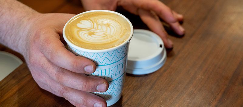 customer-enjoys-latte-restaurant-advertising-ideas